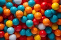 Multicolored plastic balls in ball pool at kids playground. Colorful plastic ball texture background. Many small colorful plastic Royalty Free Stock Photo