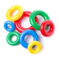 Multicolored plastic rings isolated on white. Royalty Free Stock Photo