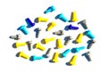 Multicolored plastic screws isolated on a white background.