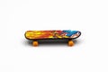 Multicolored plastic skateboard on a white background. children's toy Royalty Free Stock Photo