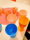 multicolored plastic tableware. Tableware for a picnic made of colored plastic Royalty Free Stock Photo