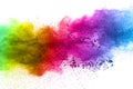 Multicolored powder explosion on white background. Colored cloud.