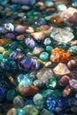 Multicolored precious beautiful stones in water. Selective focus. Royalty Free Stock Photo