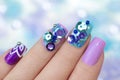 Multicolored purple blue manicure. Royalty Free Stock Photo