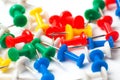 Multicolored push pins on awhite background close-up macro Royalty Free Stock Photo