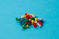 Multicolored push pins on bright blue background copy space Royalty Free Stock Photo