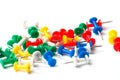 Multicolored push pins on white background close-up Royalty Free Stock Photo