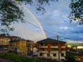 Multicolored rainbow over the houses of Tineo, Asturias, Spain, Royalty Free Stock Photo