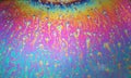 Multicolored rainbow soap bubble, psychedelic background. Abstract liquid colors and texture
