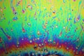 Multicolored rainbow soap bubble, psychedelic background. Abstract liquid colors and texture Royalty Free Stock Photo