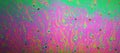 Multicolored rainbow soap bubble, psychedelic background. Abstract liquid colors and texture Royalty Free Stock Photo