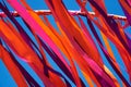 Multicolored ribbons flying in windy weather