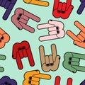 Multicolored Rock hand sign seamless pattern. Rock and roll back Royalty Free Stock Photo