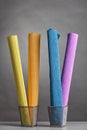 Multicolored rolls of wrinkled crepe paper stand upright in bask Royalty Free Stock Photo