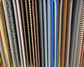 Multicolored ropes hanging vertical background close-up Royalty Free Stock Photo
