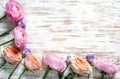 Multicolored roses on a white wooden surface.Top view.Copy space Royalty Free Stock Photo