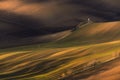 Multicolored Rural Spring /Autumn Landscape.Waved Cultivated Row Field With Hunting Tower In Springtime. Rustic Autumn Landscape