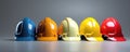 Multicolored Safety Helmets Representing Teamwork In Construction