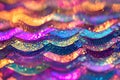 Multicolored sequins create a mesmerizing reflective wave pattern in vibrant hues of light