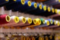 multicolored sewing threads bobbins on stand Royalty Free Stock Photo