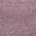 Multicolored shiny texture, sequins with blur background