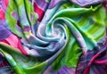 Multicolored silk. Painted natural satin. Batik. A scarf made of silk fibers.