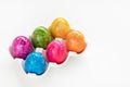 Multicolored six Easter eggs in porcelain organizer box on white background Royalty Free Stock Photo