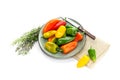 Multicolored, small peppers on a plate
