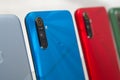 Multicolored smartphones in a row at the store window. Selective focus Royalty Free Stock Photo