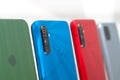 Multicolored smartphones in a row at the store window. Selective focus Royalty Free Stock Photo