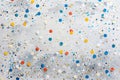 Multicolored sparkle festive confetti background.