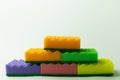 multicolored sponge scourers stacked on grey