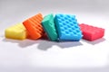 Multicolored sponges for washing dishes on white background Royalty Free Stock Photo