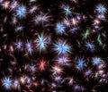 Multicolored stars, snowflakes or flowers on a black background. Abstract fractal background.