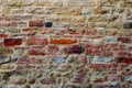 The multicolored stone wall of church