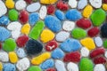 Multicolored stones. The wall is painted in different colors in texture style. Royalty Free Stock Photo