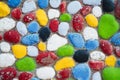 Multicolored stones. The wall is painted in different colors in texture style. Royalty Free Stock Photo