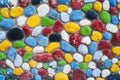 Multicolored stones. The wall is painted in different colors in texture style. Royalty Free Stock Photo