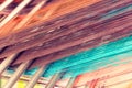 Multicolored straight strands texture background, sewing equipment, loom equipment at a garment factory