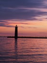 Multicolored sunset behind Muskegon Michigan lighthouse