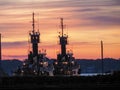 Multicolored sunset behind Muskegon Michigan tugboats