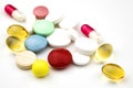Multicolored tablets on white background. Health care concept Royalty Free Stock Photo