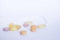 Multicolored tablets on a white background Royalty Free Stock Photo