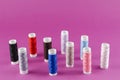 Multicolored Thread Reels on Purple Background Royalty Free Stock Photo