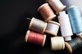 Multicolored threads on a black background Royalty Free Stock Photo