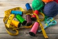 Multicolored threads, scissors and ruler. Royalty Free Stock Photo