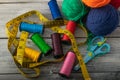 Multicolored threads, scissors and ruler. Royalty Free Stock Photo