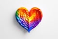 Multicolored three-dimensional heart of geometric shapes on white background