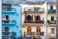 Multicolored traditional houses in the port area of Giardini Naxos in Sicily Royalty Free Stock Photo