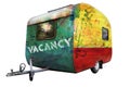 A multicolored trailer with caption Vacancy